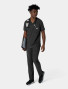 Pant and matching top view of a healthcare worker wearing the Carhartt mens straight leg pant C56410 in black