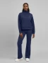 Full-length model view of Med Couture Insight Women's Half Zip Pullover Scrub Jacket MC00079 in Navy