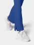 Side-slit hem detail of Med Couture Insight Women's Mid-Rise Flare Leg Scrub Pant MC010 in Royal