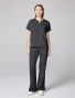 Full-length model view of Cherokee Workwear Revolution Women's Mandarin Collar Dolman Scrub Top CK00038 in Pewter