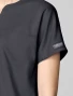 Sleeve logo detail of Cherokee Workwear Revolution Women's Mandarin Collar Dolman Scrub Top CK00038 in Pewter