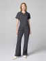 Full-length model view of Cherokee Workwear Revolution Women's Mid Rise Flare Cargo Scrub Pant CK00039 in Pewter