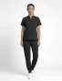 Full-length model view of Healing Hands HH Works Women's Macy Scrub Top HH650 in Black