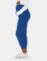 Side view of Med Couture Touch Women's Maternity Jogger Scrub Pant MC029 in Royal