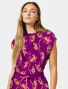 Front view of Med Couture Amp Women's Printed Dolman Scrub Top MC00015 in Into The Wild
