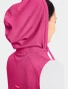 Collar and snap detail of Med Couture Amp Women's 4-Pocket Zip Front Scrub Vest MC500 in Pink Power