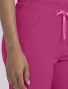 Pocket detail of Med Couture Amp Women's High Rise 4-Pocket Flare Scrub Pant MC104 in Pink Power