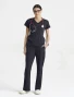 Full-length model view of Grey's Anatomy by Barco Cultivate Women's Spring Scrub Top GRGT309 in Steel