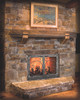 Lit wood fireplace with Mediterranean fireplace door
