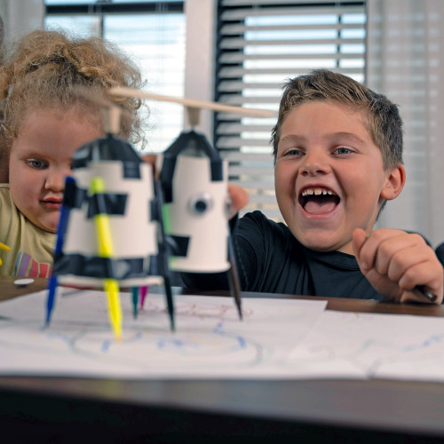 TWO KIDS WITH TWO ART BOTS