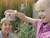 Kids using the bug magnifier to look at a bug