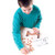 Image of child using the kit to build an experiment from activity book.