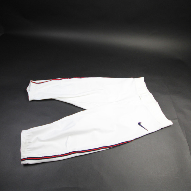 white nike baseball pants with black piping