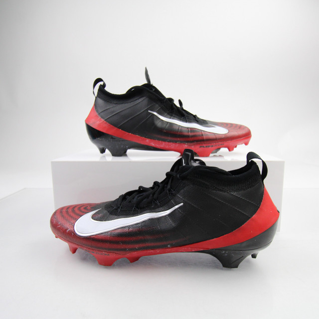 football cleats red and black
