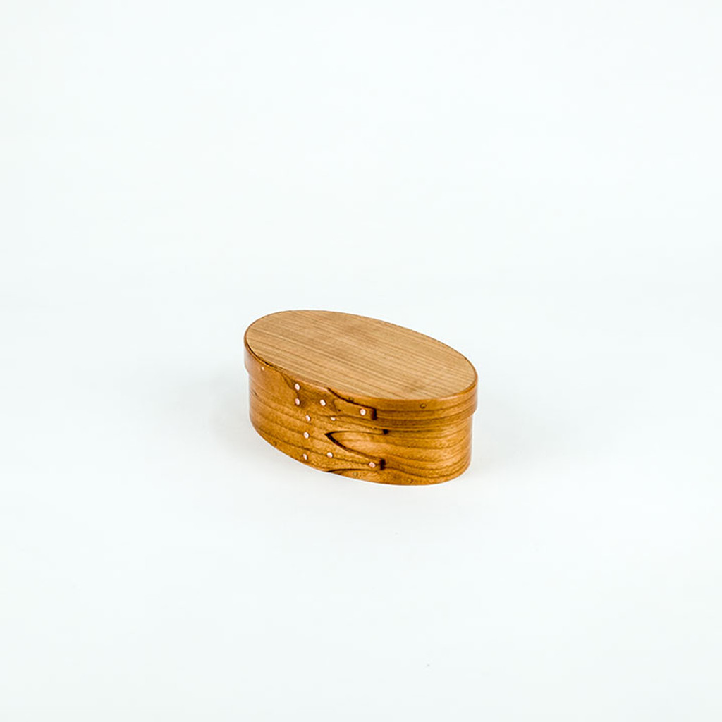 Men use the #1 shaker oval box to hold USB thumb drives.