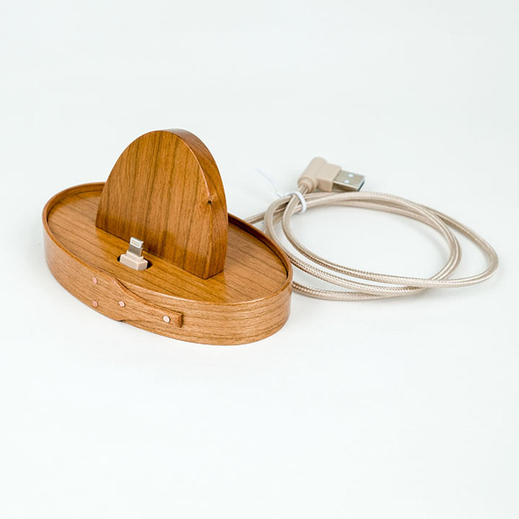 Handcrafted wooden #1 iPhone docking station keeps your phone handy during recharging or syncing.