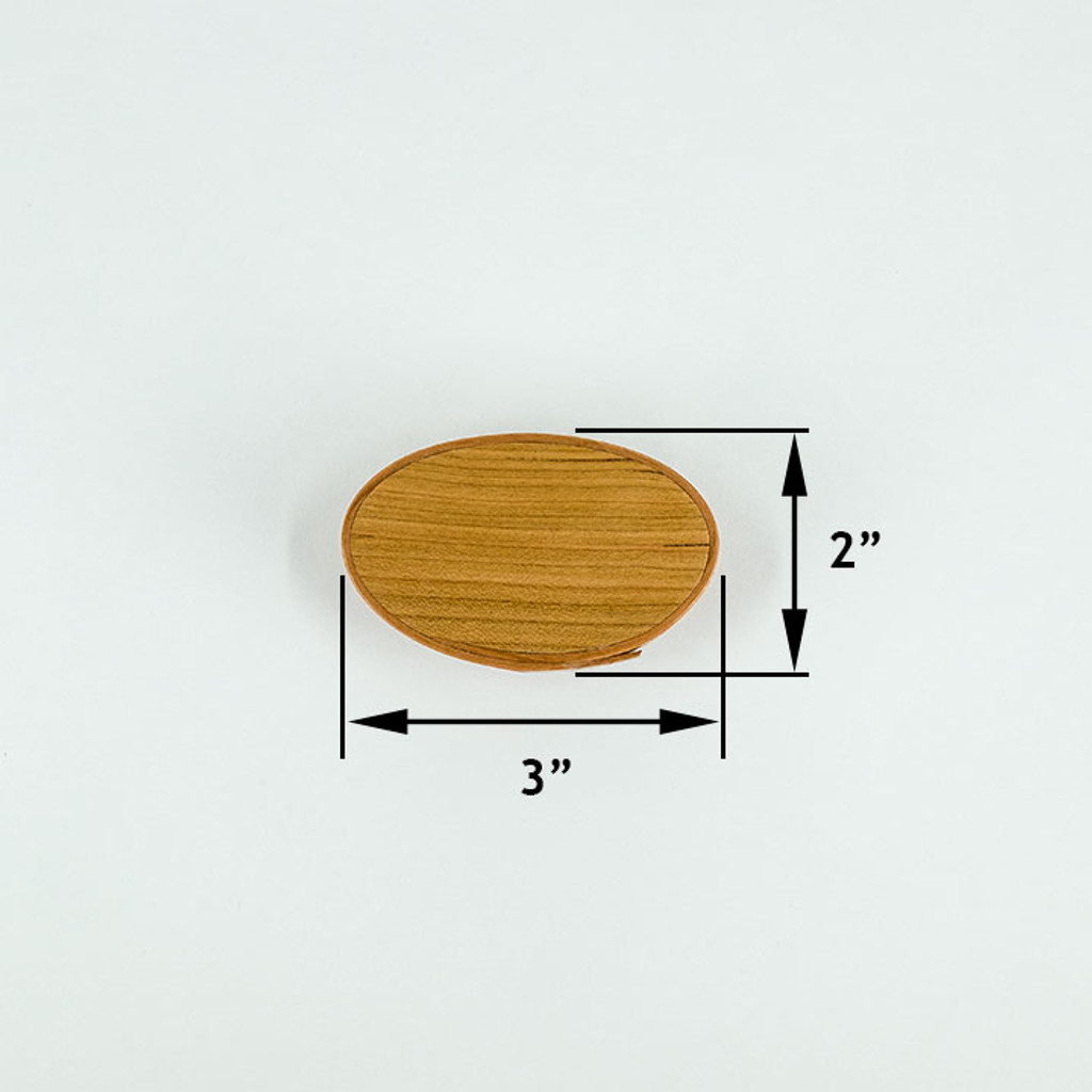 Handcrafted #00 shaker oval box organizes pocket change.