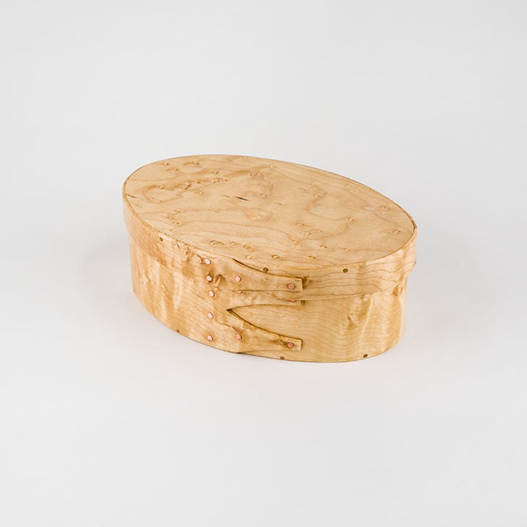 Handcrafted #2 shaker Birdseye Maple lidded box organizes fine collectibles and has its own interesting story.