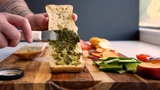 3 ½" Sandwich Spreader spreading pesto on ciabatta bread