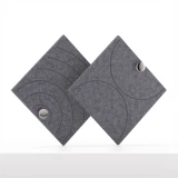 Cubox Soft Panel Granitgrau mit elegantem Metallknopf, zwei Panels sich kreuzend