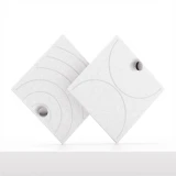 Cubox Soft Panel Gletschergrau mit elegantem Metallknopf, zwei Panels sich kreuzend