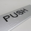 Push Braille Sign