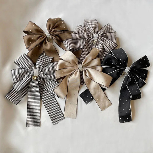 Pearl and CZ big ribbon