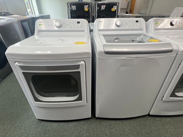 LG 5.0 cu. ft. Top Load Washer with TurboDrum Technology and 7.3 cu. ft. ELECTRIC Dryer with LoDecibel Quiet Operation DLE7150W WT7155CW