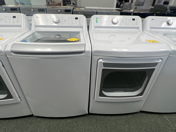 LG 5.0 cu. ft. Top Load Washer with TurboDrum Technology and 7.3 cu. ft. ELECTRIC Dryer with LoDecibel Quiet Operation DLE7150W WT7150CW