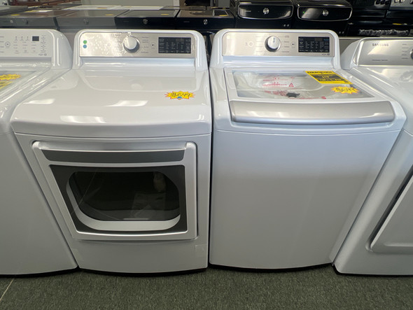 LG 5.3 cu. ft. Top Load Washer with 4-Way Agitator and 7.3 cu. ft. GAS Dryer with EasyLoad Door DLG7401WE WT7400CW