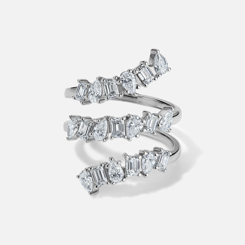 White gold, three row, mix shaped diamond ring with pear and emerald cut diamonds.