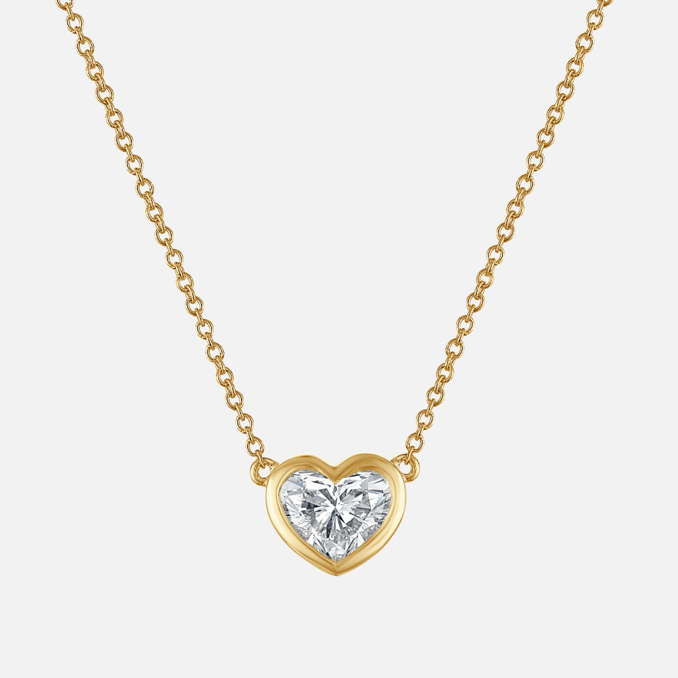 Refined heart diamond pendant necklace, bezel set in yellow gold
