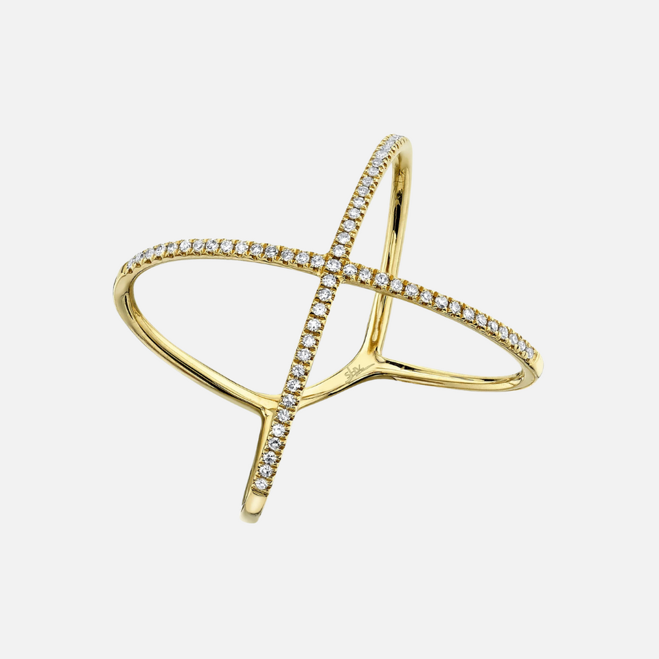 This yellow gold Shy Creation ring features an X shape embellished with diamonds.