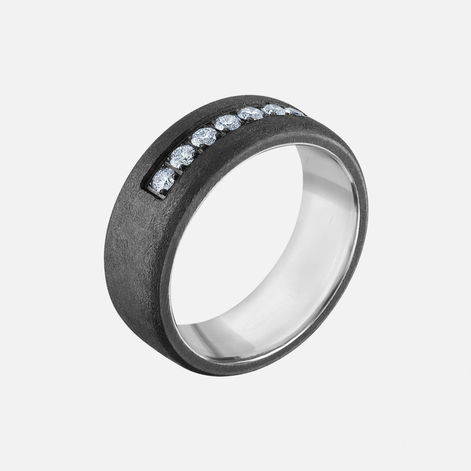 tantulum with white gold mens wedding band accented with 9 round diamonds in the center with white gold in the inside