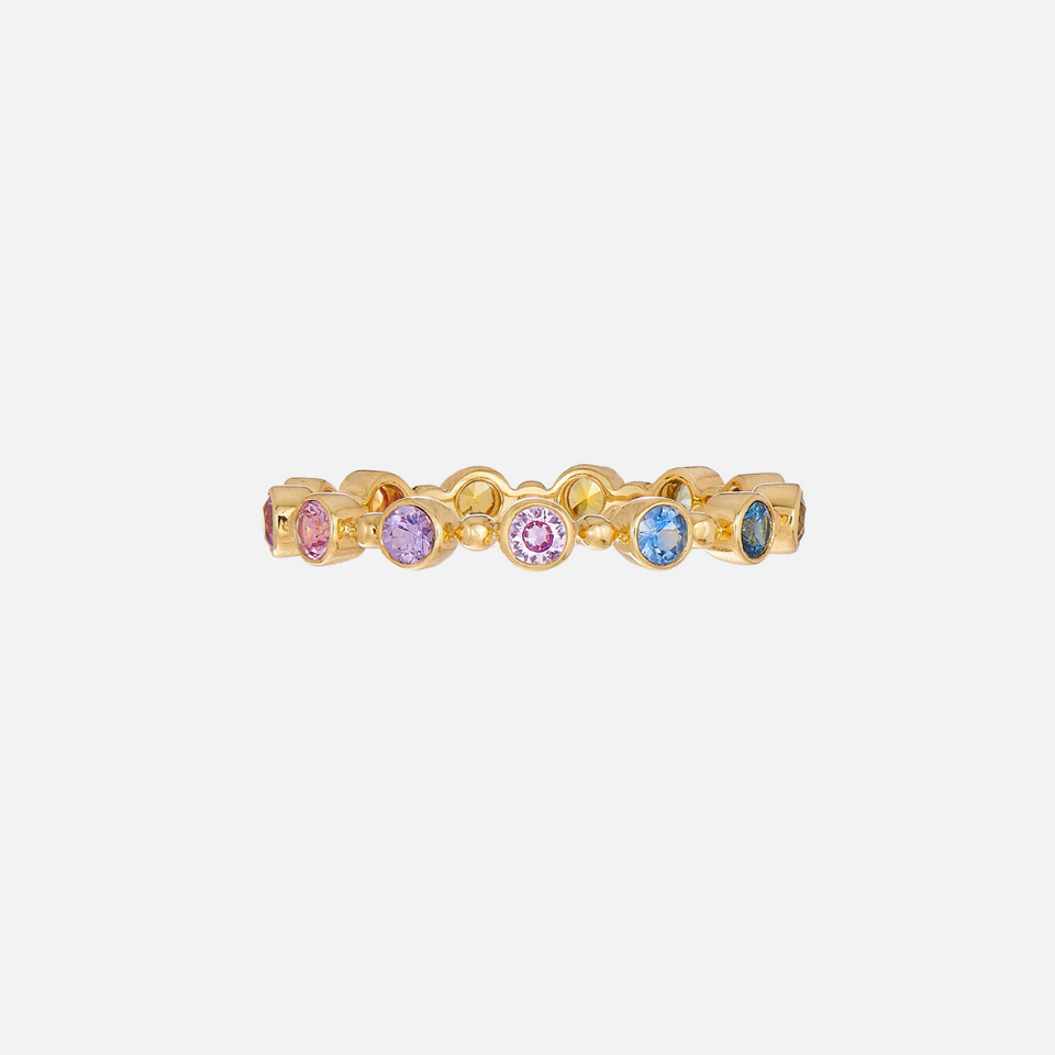 This petite band features 13 brilliant-cut multi-color sapphires set in yellow gold.