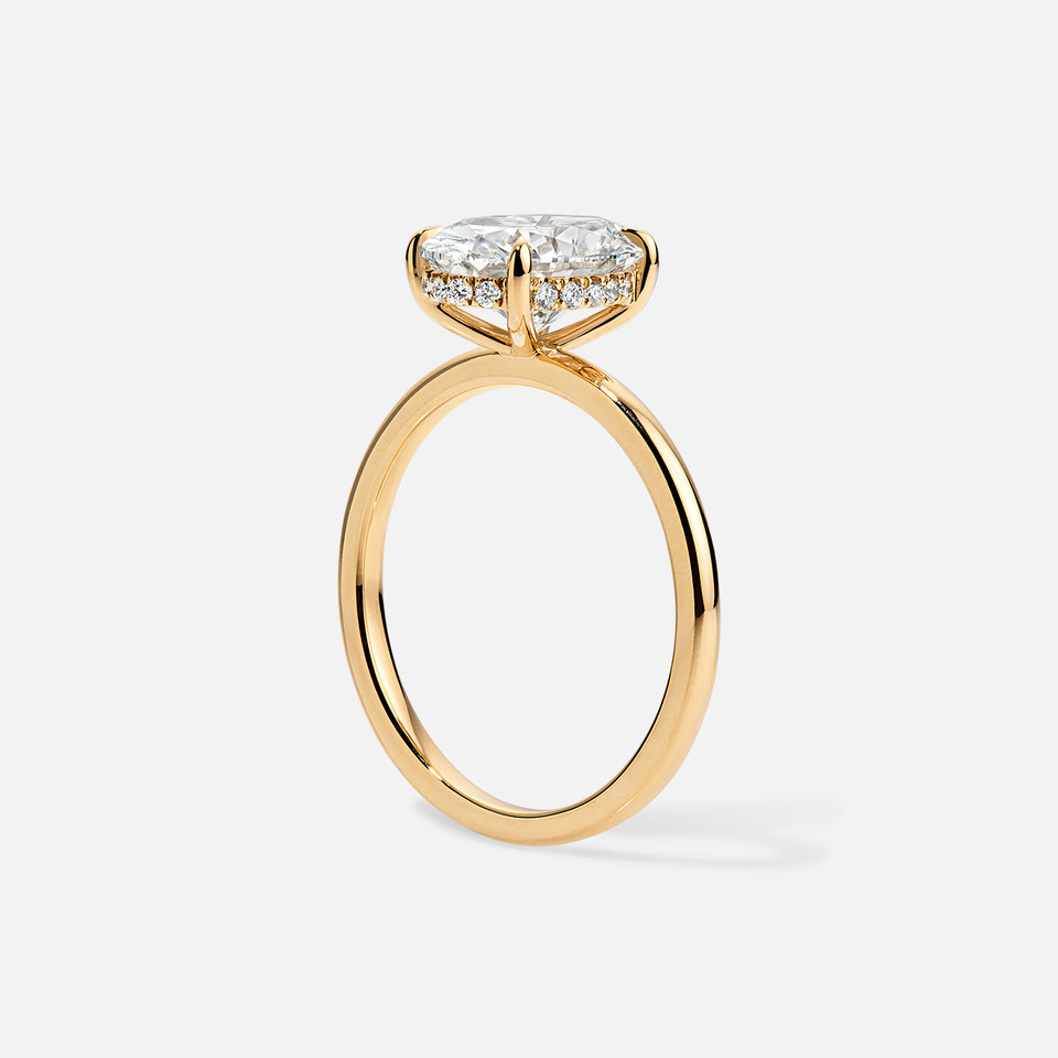 Forever by Razny Solitaire Classic Semi-Mount for Oval Diamond With Round Diamond Accents in yellow gold