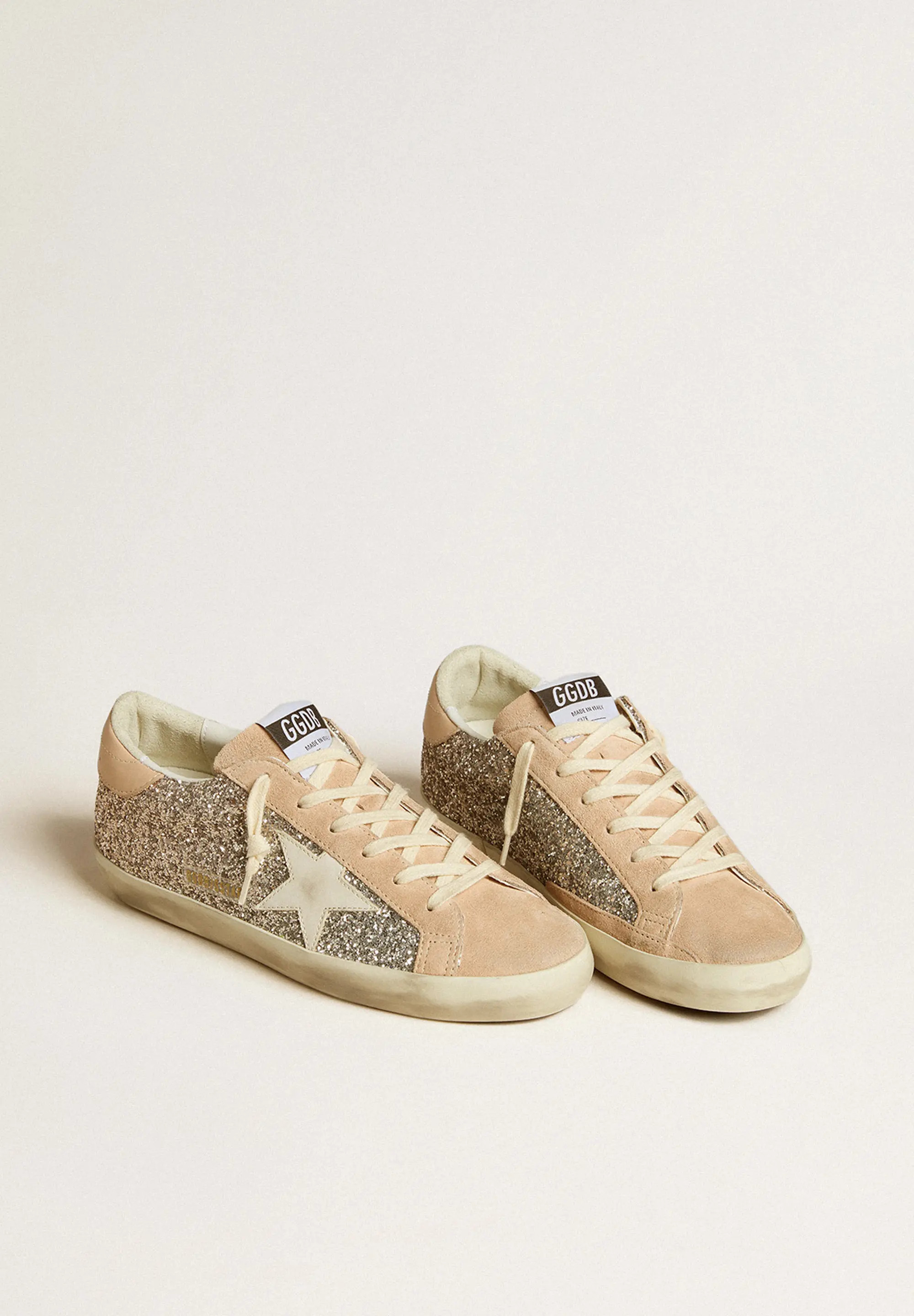 Super-Star sneakers with silver glitter, leather star, and