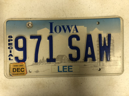 December 2007 Tag IOWA Lee County Special License Plate 971-SAW Saw Jigsaw Farm Silo City Silhouette