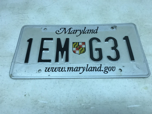 Expired , white Maryland License Plate 1EM-G31.