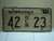 2004 NEBRASKA Dealer License Plate 42 DLR 23