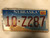 2002 NEBRASKA Platte County License Plate 10-Z287 City Silhouette
