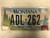 2007 Tag MONTANA Open Land License Plate ADL-262 Forest Trees Mountain River