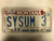 1976 (1991 Tag) MONTANA Big Sky '76 Bicentennial License Plate SYSUM-3 Cow Skull