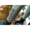 Close up of cyclist wearing green 4 SEASONS PRO Jacket
