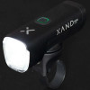 LED Headlamp 1000 Lumen, turned on in a dark studio at 1000 lumen