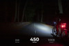 LED Headlamp 1000 Lumen, turned on in a dark environment at 450 lumen