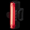 LED Rear Light 30 Lumen turned on in a dark environment viewed from the side