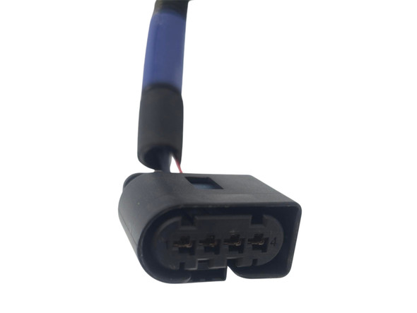 Close-up of the old-style connector on the Genuine Cummins 5347703 VGT actuator adapter harness.