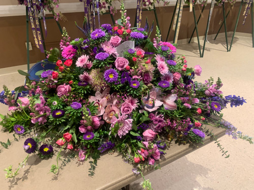 LAVENDER DREAMS CASKET SPRAY- ON SALE WAS $380