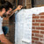 Application of Block & Wall™ Liquid Rubber on interior brick wall